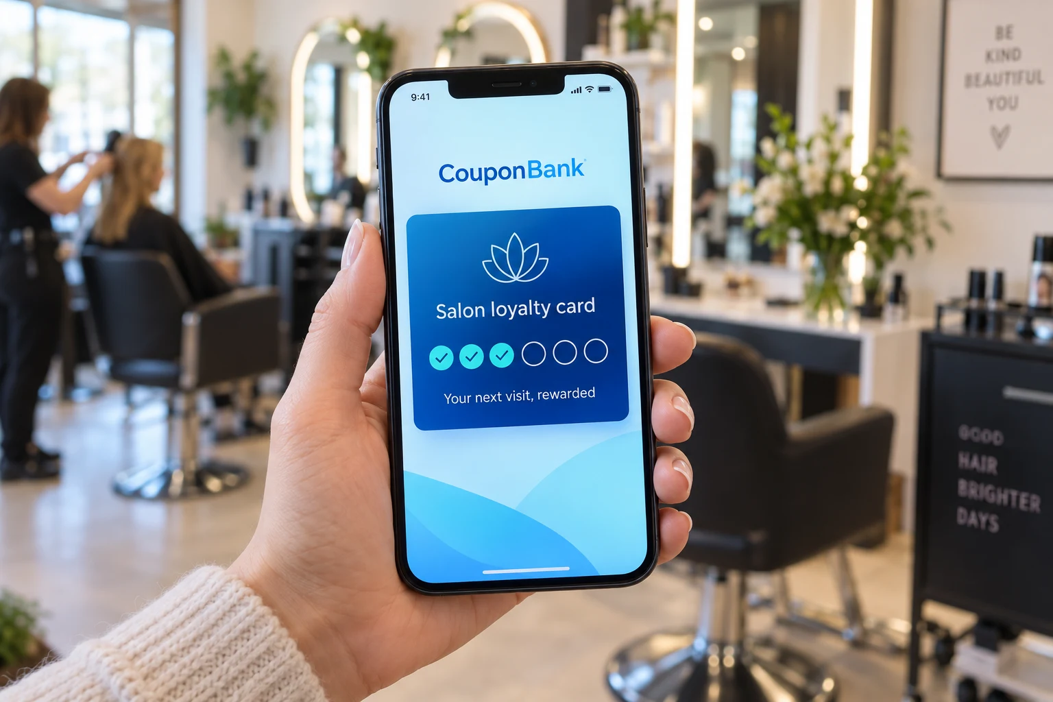 A beauty customer holding a CouponBank digital salon loyalty card